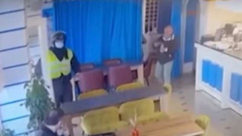 Moment man gunned down in cafe with police hunting Brits over public execution