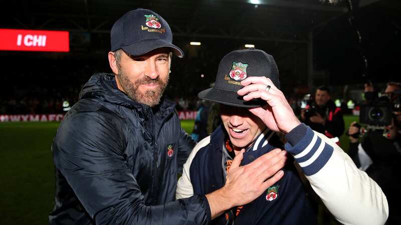 Ryan Reynolds and Rob McElhenney embrace after Wrexham