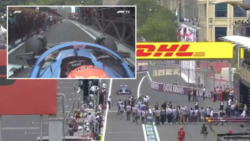 Photographers in the pit lane as Esteban Ocon comes in at the end of the Azerbaijan GP (Image: Sky Sports)