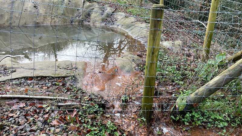 Liquid flows out of the Ty Llwyd Quarry earlier this year (Image: PA)