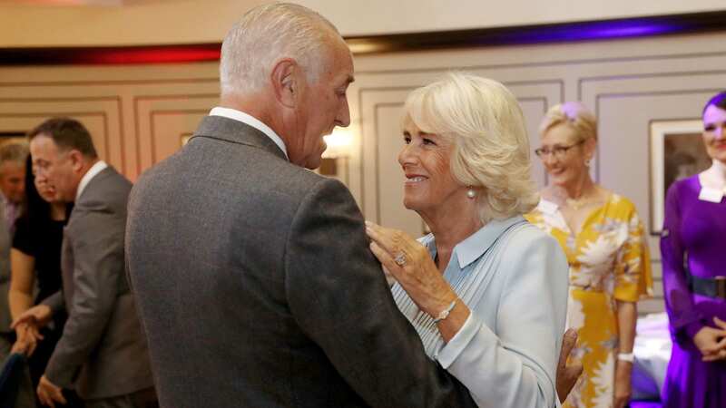 The King and Queen Consort dancing together (Image: PA)