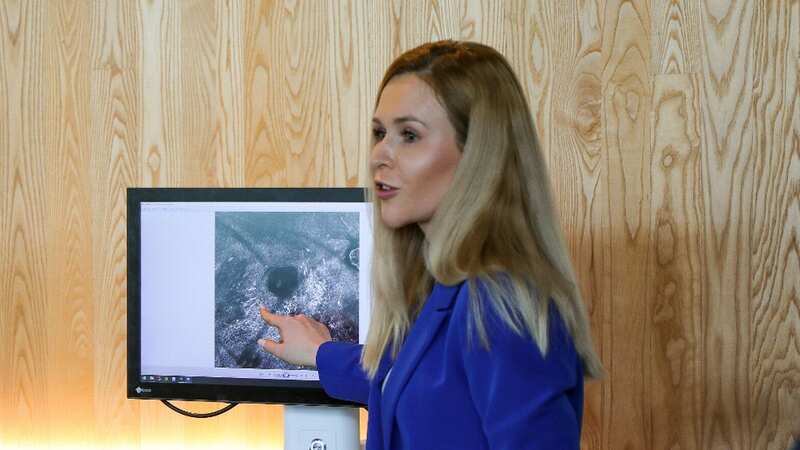 Joanna Ludzik talks through the work (Image: OHSU/Christine Torres Hicks)