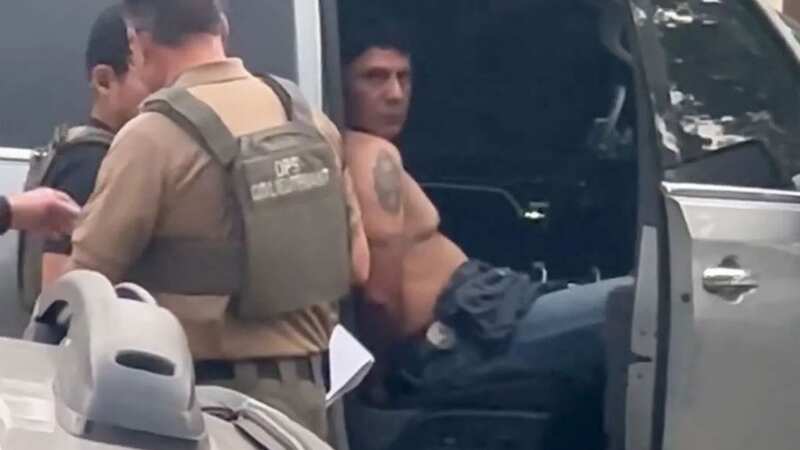 Moment police caught gunman in closet 20 miles away from mass murder spot