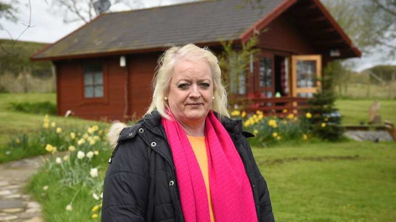 Hazel Cullen outside the cabin (Image: Jonathon Hill)