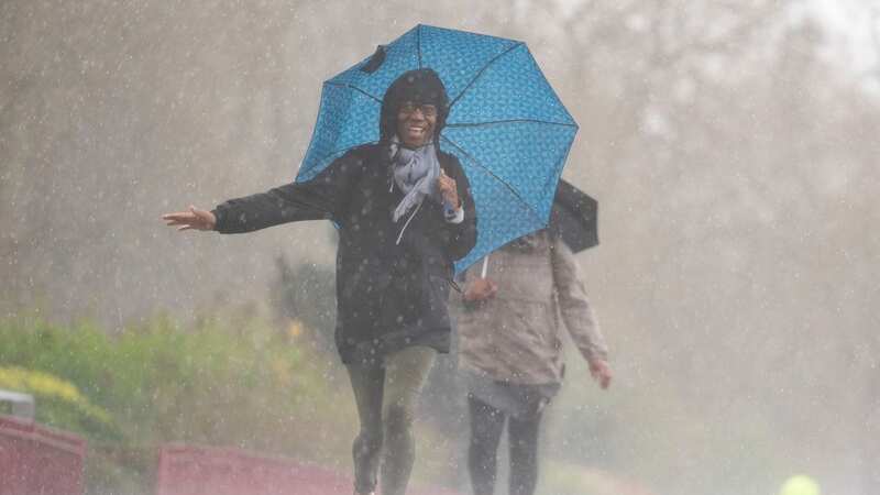 Brits will have the brave heavy showers on Bank Holiday Monday (Image: PA)