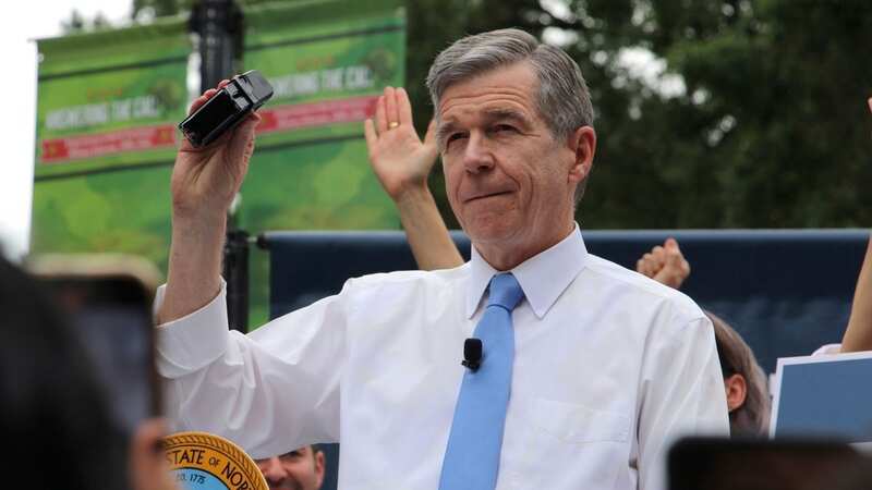 North Carolina Democratic Gov. Roy Cooper affixes his veto stamp to a bill banning nearly all abortions after 12 weeks of pregnancy (Image: AP)