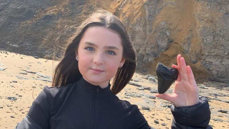 Cydney Root, 12, found the tooth on the beach (Image: Credit: Pen News/Sophie Freestone)