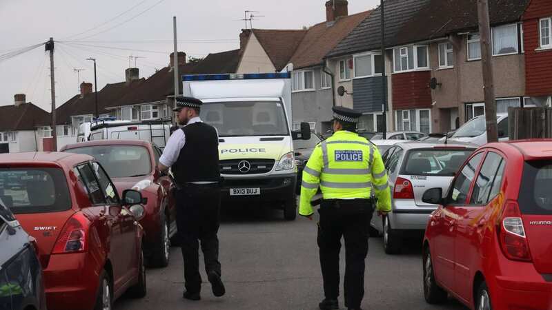 Police put up a cordon around the home in Sidcup, south east London (Image: UkNewsinPictures)