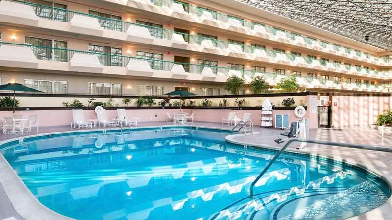 A Bronx mother-of-two has been arrested for manslaughter in the alleged death of her seven-year-old daughter who drowned in the hotel swimming pool