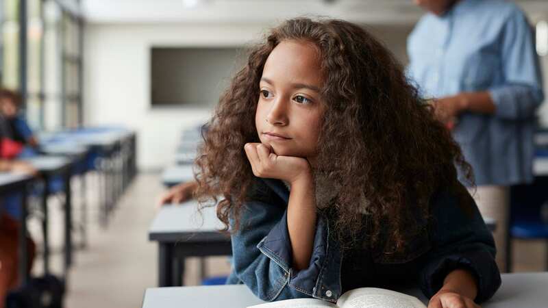 The teacher was handed $116 (£93) at the end of the school day (stock photo) (Image: Getty Images)