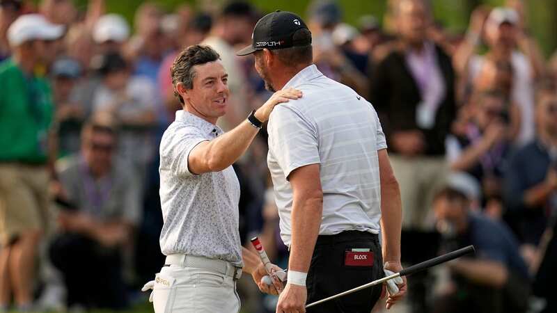 Rory McIlroy congratulates Michael Block after his hole-in-one at Oak Hill (Image: Abbie Parr/AP/REX/Shutterstock)