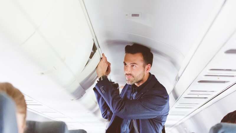 He used her credit card to book a flight to visit his family (stock photo) (Image: Getty Images)