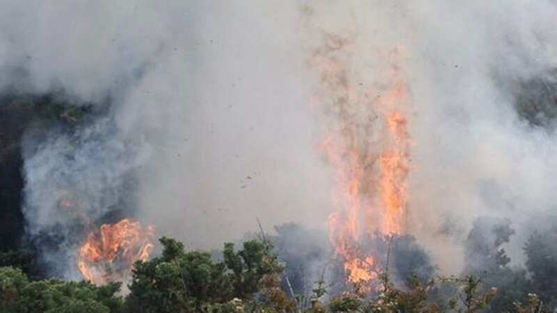 Huge fire rages through mountain as firefighters battle blaze for 18 hours