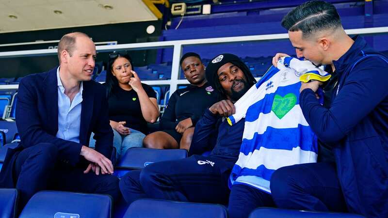 Prince William was today presented a shirt by Grenfell survivors and bereaved (Image: AP)