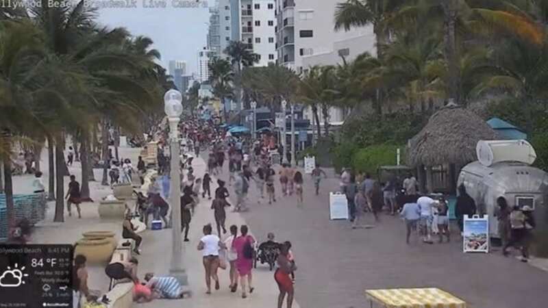 Girl, 1, among nine gunned down in beach shooting as people frantically flee