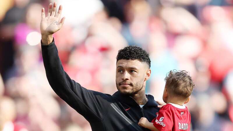 Alex Oxlade-Chamberlain bids farewell to Liverpool fans following the game against Aston Villa (Image: Paul Greenwood/REX/Shutterstock)