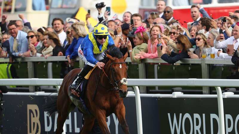 Richard Kingscote riding Desert Crown to victory in the Cazoo Derby last year