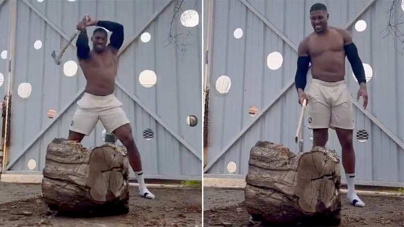 Anthony Joshua channels his inner Rocky as he breaks axe while chopping wood
