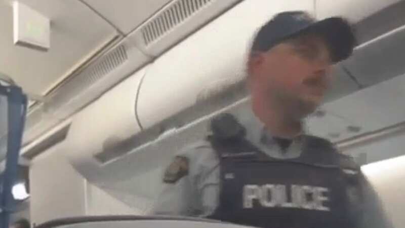 Unruly passenger breaks free of restraints on plane as captain diverts flight