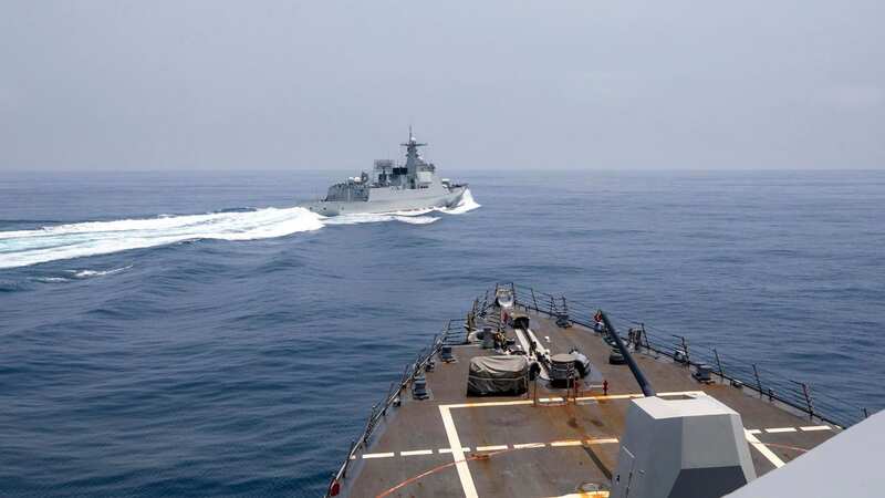 Dramatic moment Chinese ship cuts across US destroyer in 