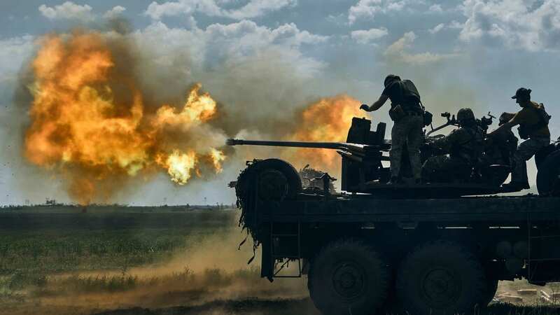 Ukrainian soldiers fire a cannon near Bakhmut, an eastern city (Image: LIBKOS/AP/REX/Shutterstock)