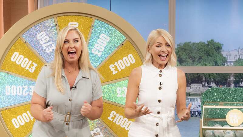 Holly wore the stunning white dress as she returned to present This Morning on Monday (Image: Ken McKay/ITV/REX/Shutterstock)