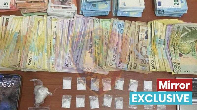 Police have provided one picture showing money and drugs seized from where Stephen Richards, 27, and Richard Deacon, 32, were staying