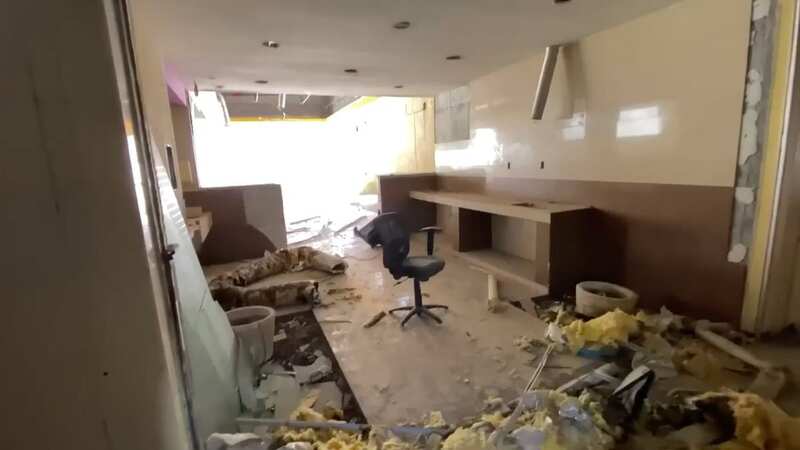 Abandoned hospital frozen in time with creepy satanic symbols on the walls