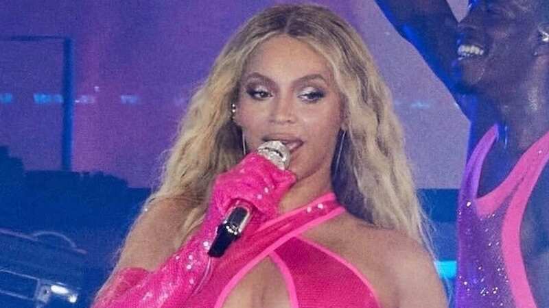 Beyonce channels inner Barbie as she dons racy bubblegum-pink thigh-slit dress