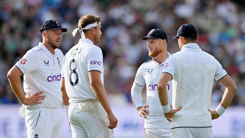 Ben Stokes speaks to bowlers Stuart Broad, James Anderson and Ollie Robinson