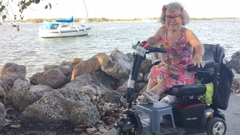 Tanyalee Davis on her mobility scooter (Image: Tanyalee Davis / SWNS)