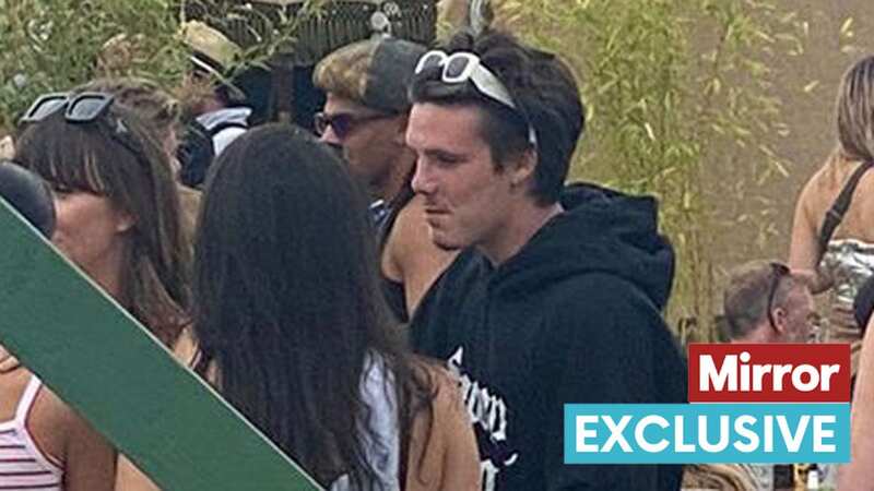 Cruz Beckham keeps it casual as he hangs out with pals at Glastonbury Festival (Image: WHATSAPP)