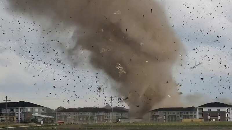 Moment tornado rips through homes as giant painful hail stones rain down