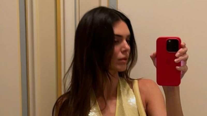 Kendall Jenner wows fans as she goes braless in tight yellow sequinned gown