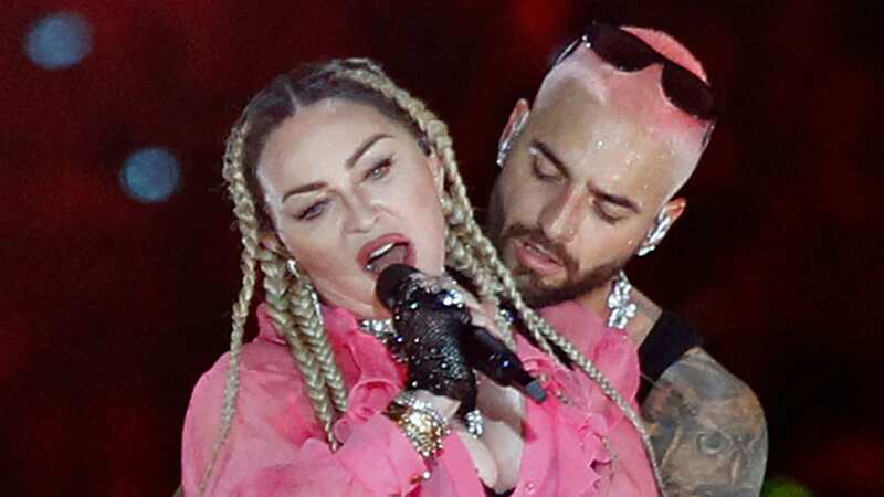 Madonna performing on stage (Image: AFP via Getty Images)