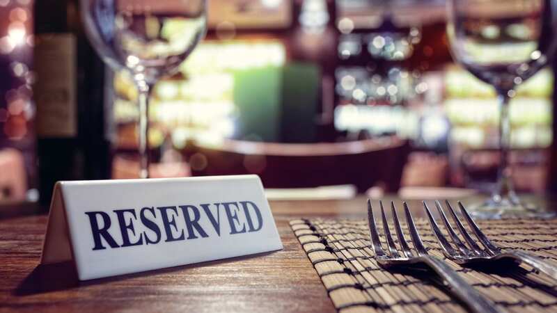 You could get slapped with a bill for hundreds of pounds for cancelling your reservation late at some restaurants (stock image) (Image: Getty Images/iStockphoto)
