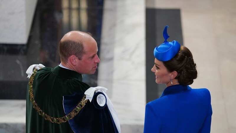 William and Kate share a smile during the service at St Giles