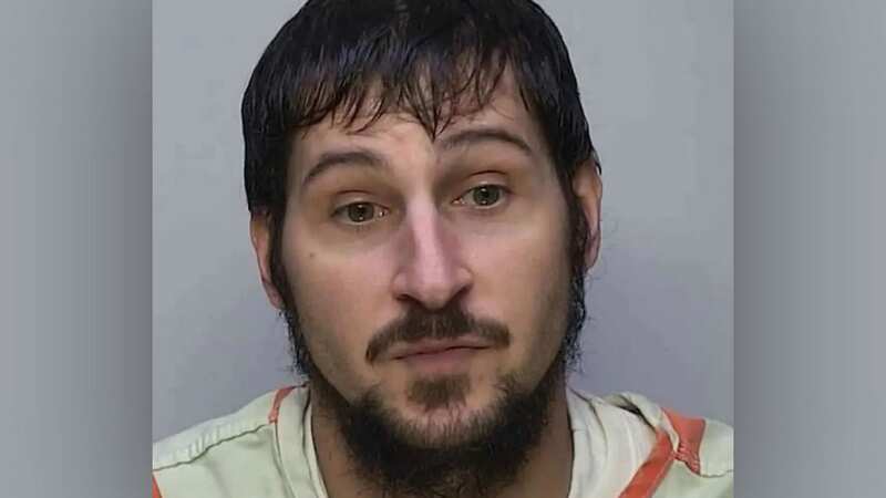A massive manhunt has been launched to track down Burham (Image: Warren County Jail)