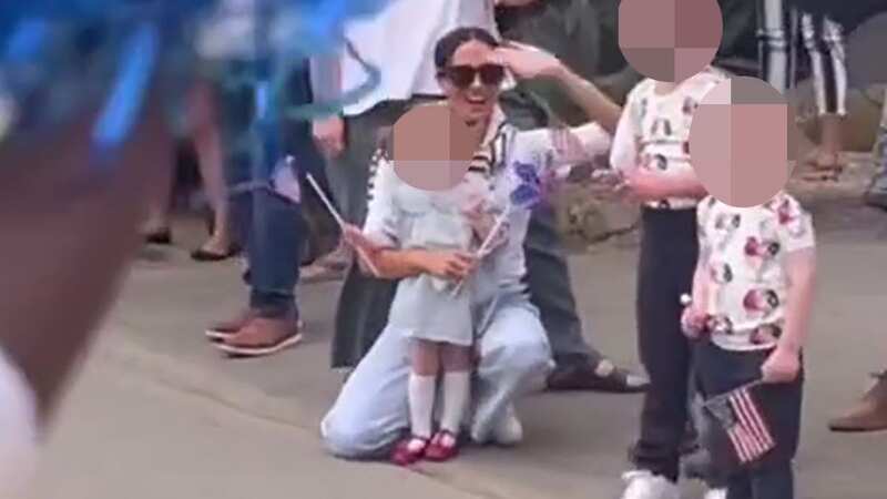 Meghan cuddles Princess Lilibet during family day out in adorable video