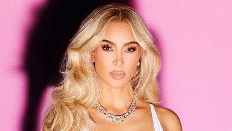 Kim Kardashian announces partnership with Alani Nu with new glamorous photoshoot in white leotard (Image: alaninutrition/Instagram)
