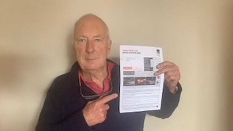 Andy Smith with the parking fine (Image: BPM Media)
