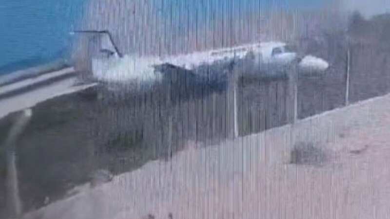 Heart-stopping moment plane with 34 passengers skids off runway breaking in two