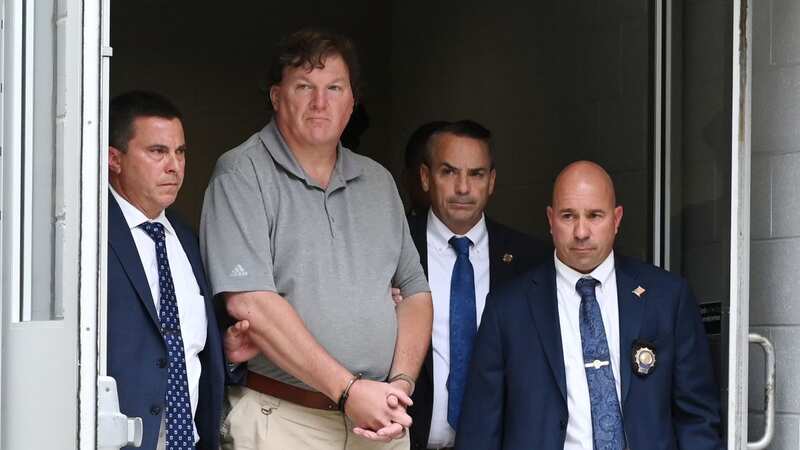 Rex Heuermann being walked out of the Suffolk County Police 7th Precinct in connection with the Gildgo Beach murders (Image: John Roca/Newsday / SplashNews.com)