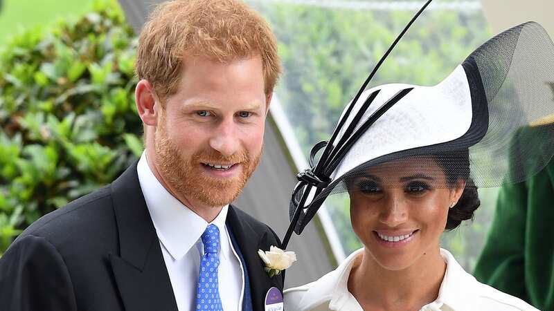 Meghan Markle and Prince Harry are very loved-up (Image: WireImage)