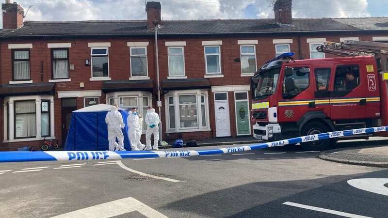 Woman dies in house fire after firefighters pull her from window