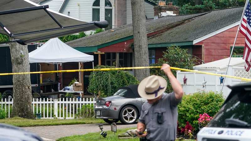 Authorities search the home of Hauermann at Massapequa Park in Lond Island (Image: AP)