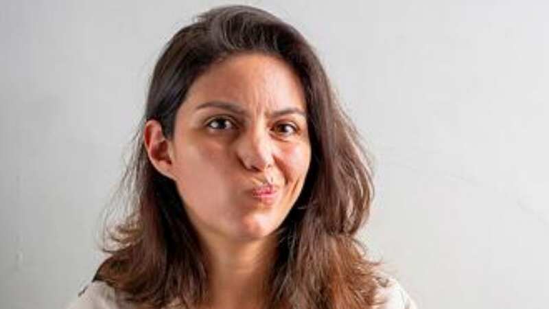 A woman felt humiliated when her husband pushed her away as she started kissing him (Stock photo)
