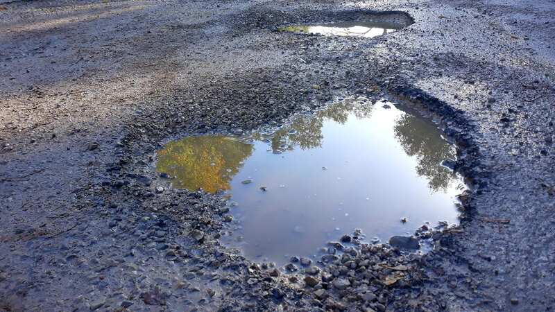 Potholes are causing pain to motorists (Image: Getty Images)