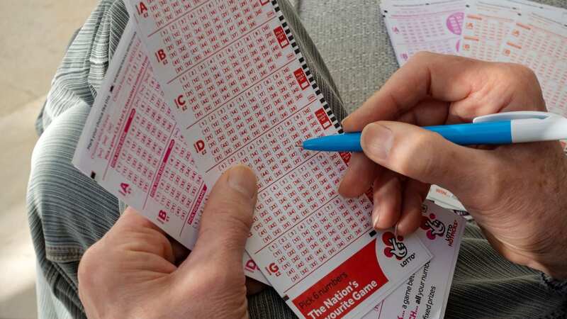 A man fills in a Lotto lottery slip (stock) (Image: Loop Images/Universal Images Group via Getty Images)