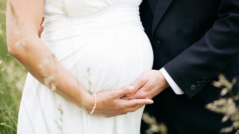 The bride will be 20 weeks pregnant on her wedding day (stock photo) (Image: Getty Images/Westend61)